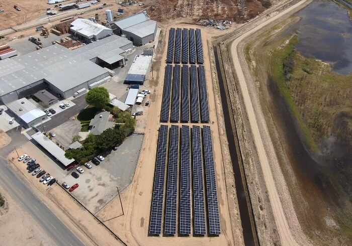 Overhead view of solar design and installation for client with limited developed land.
